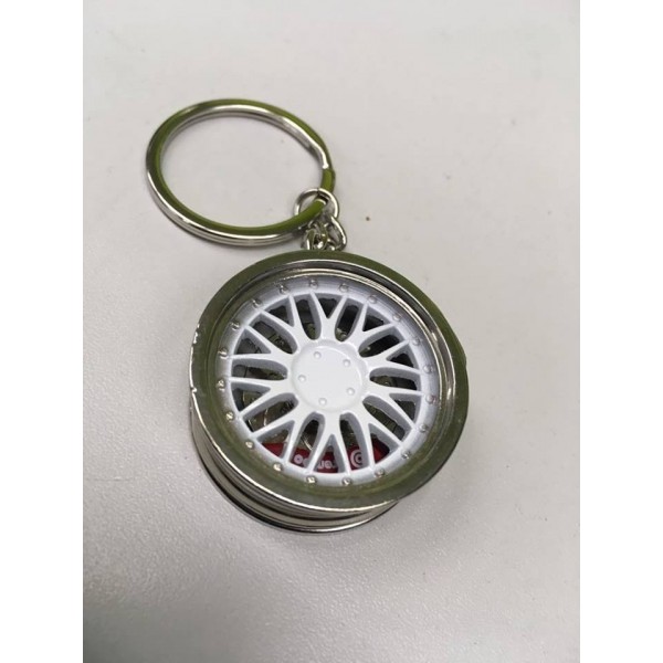 Prívesok na kľúče - elektrón vo bielym prevedení s brzdovým strmeňom