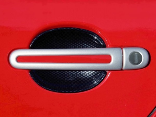 Škoda Octavia II / facelift - Kryty kľučiek - oválný otvor, ABS strieborné (4 + 4 ks jeden zámok)